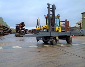 A CombiLift transporting steel across the AJN Steelstock Henstridge site